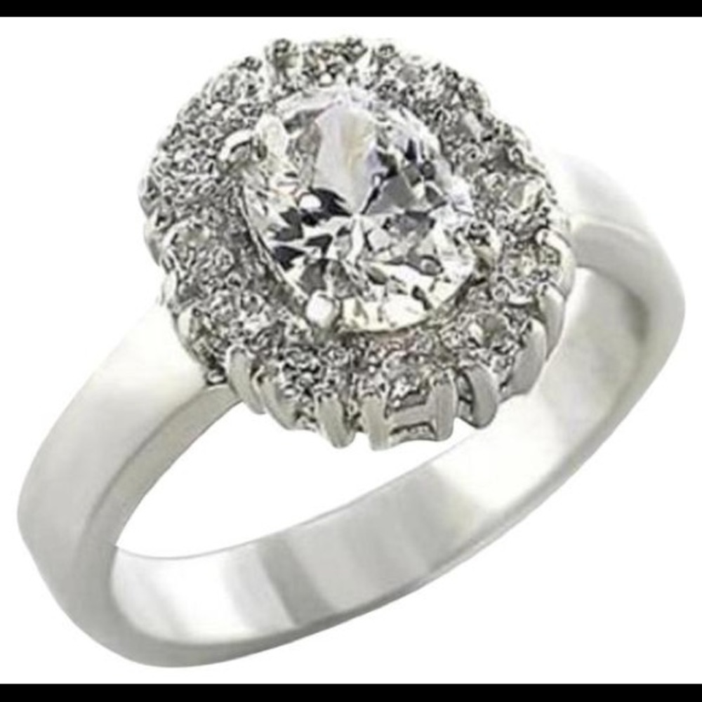 New 2.1 Ct. Rhodium Plated Cubic Zirconia Ring. 6.
